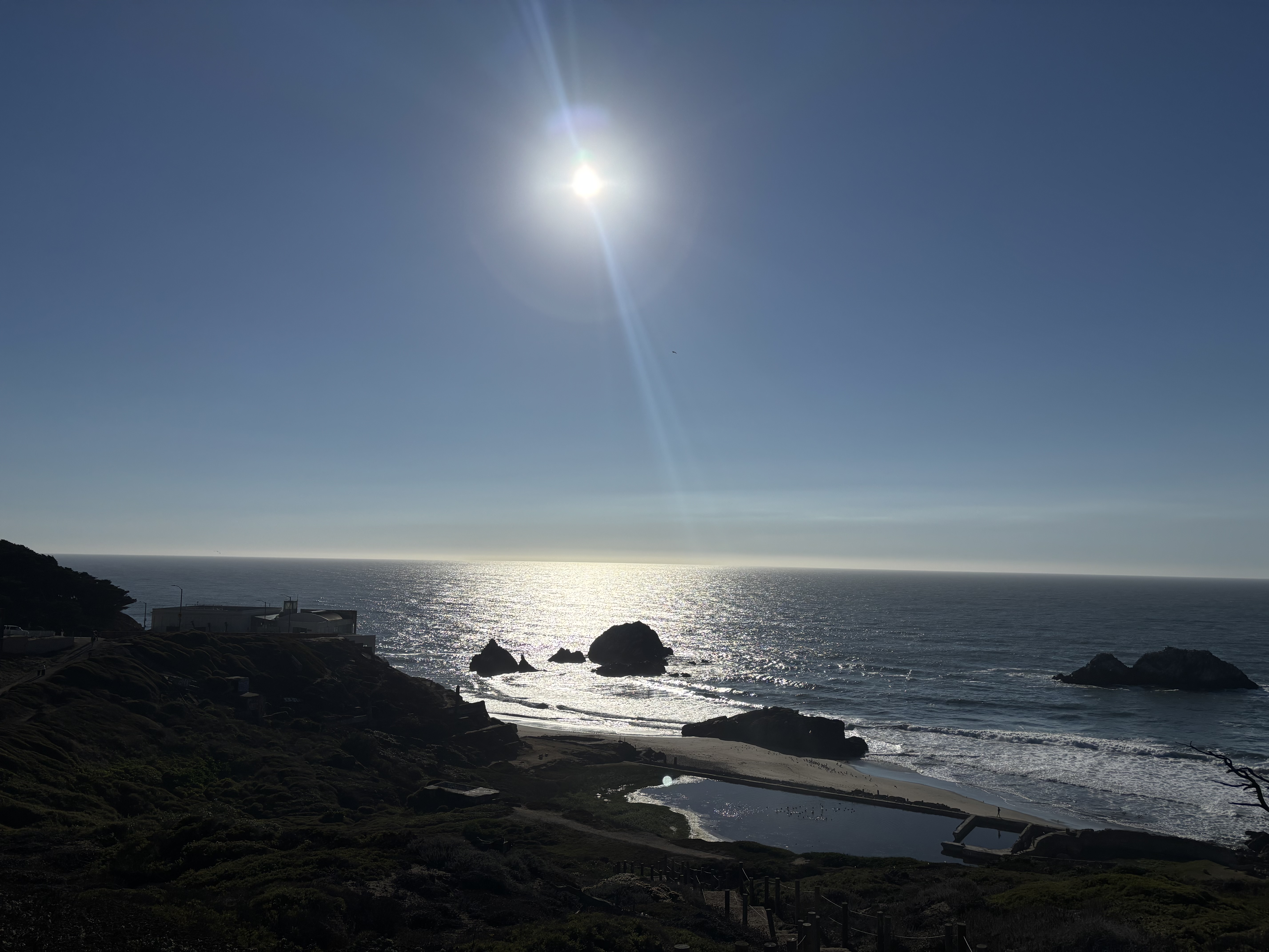 Sun over the Pacific above the Sutro Baths ruins and Seal Rocks, San Francisco